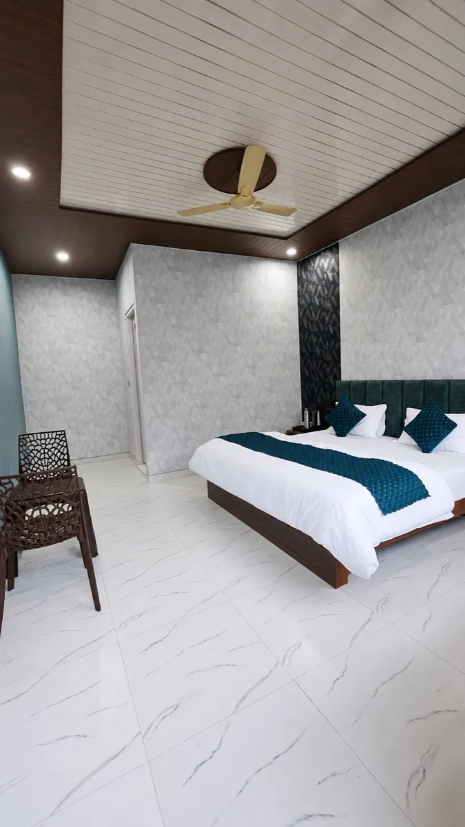 Spacious room with marble floor and seating