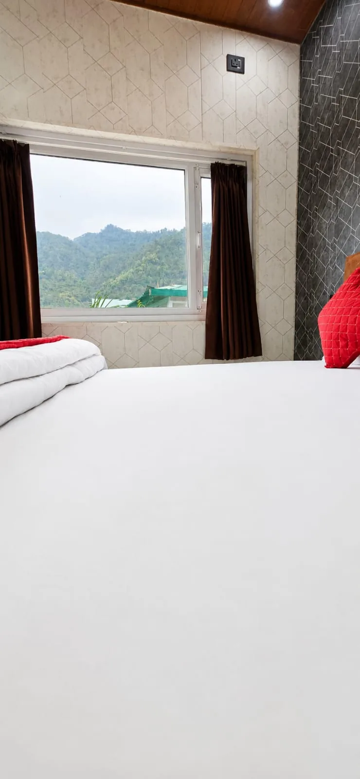 Guest room with a picture window over the valley