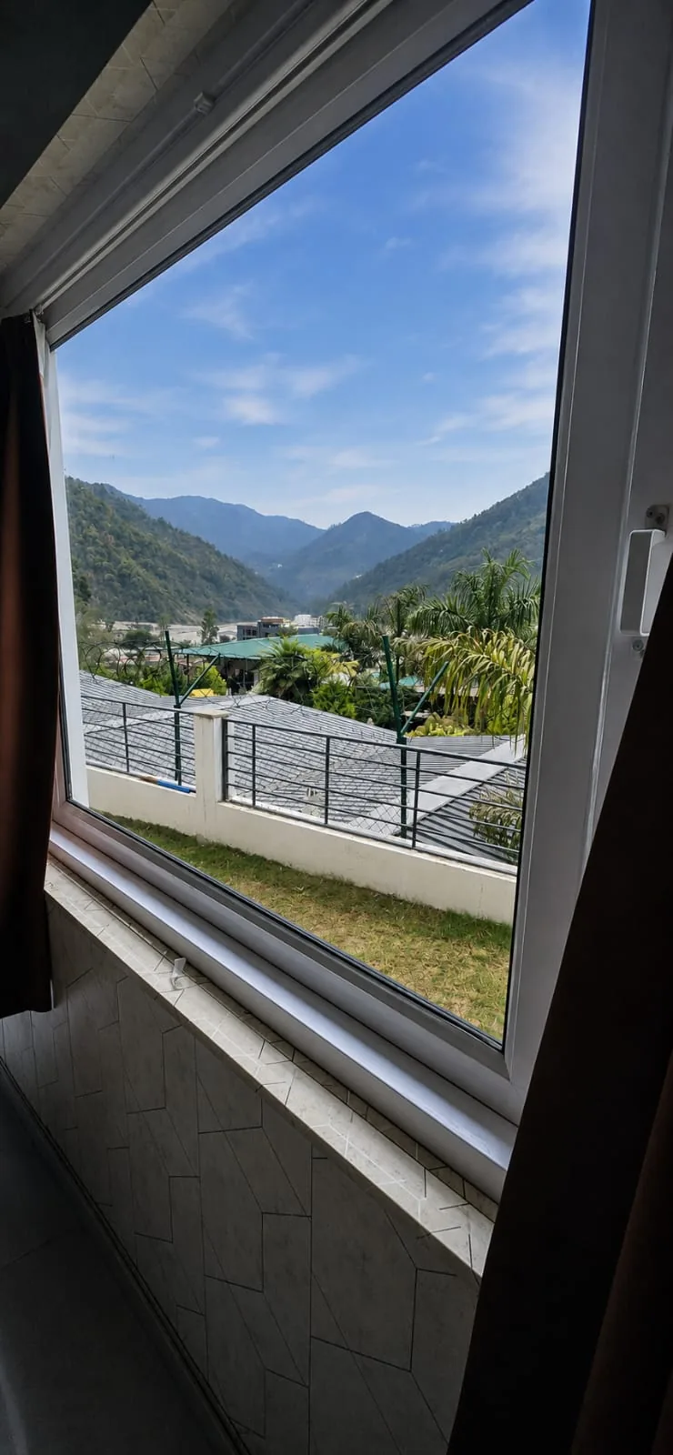 Himalayan valley and river view from a guest room window